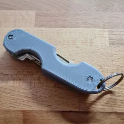 Remixed Swiss Key Holder with hole for a ring