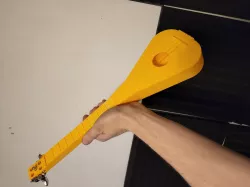 3 string ukulele-like instrument