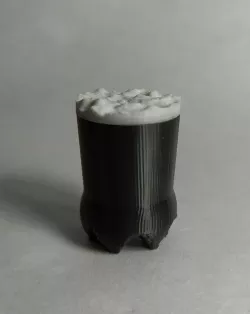 Botella de Fernet con Coca cortada