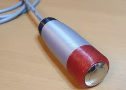 Handheld case for pushbutton