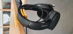 Headphone holder with cable clip