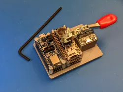 "Homefruit" Test fixture for Adafruit Feather