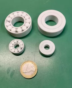 Parametric roller and slide bearing
