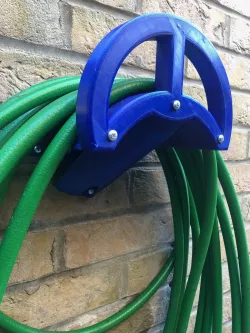 Hose holder/hanger