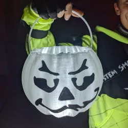 Lighted jack-o-lantern pumpkin candy pale.  Safe and fun!