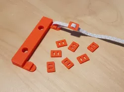 Rubber band adjuster for face mask
