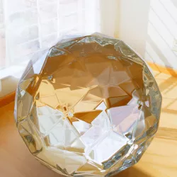 Hexagon derived, faceted approximately spherical hollow shape with filleted edges