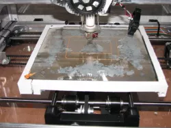 glass plate fixture, but tends to warp the bed!