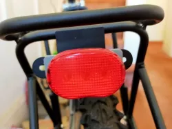 Cycle rack lamp bracket