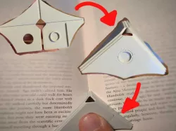 Foldable thumb book holder