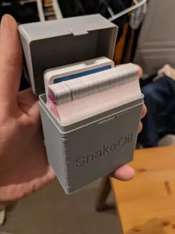 Snake Oil card game box