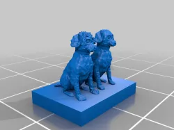 2 miniature poodles sitting female and male, sculpture.