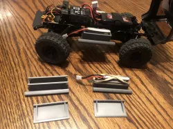 SCX24 rock slider/ battery saddle pack 