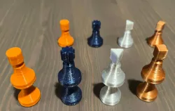 Tactile board game pawns for blind and visually impaired players (ludo pieces, Mensch Ärger Dich Nicht)