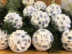 Ten Minimal Surface Ornaments and Spheres