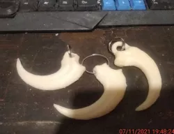 Velociraptor dinosaur claw keychain