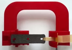 Slingshot - a tool for joining of pocket to a rubber band