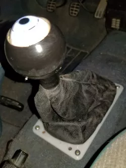 VW Jetta shifter boot base.
