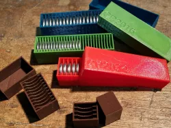 Parametric button cell storage box