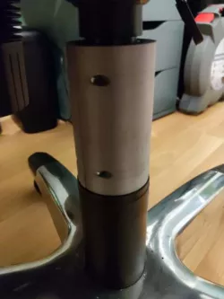 Desk chair piston spacer