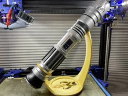 Tilted display stand for lightsaber hilt - Mythosaur