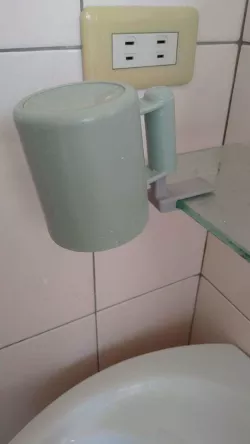 Tooth cup hanger
