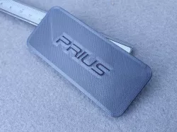 Toyota Prius trunk service hole cover