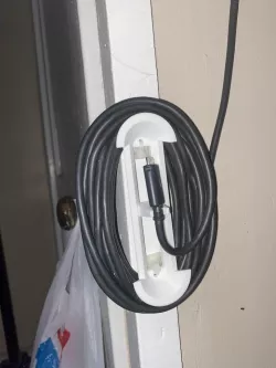Wall mounted cable holder