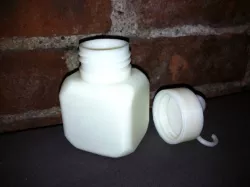 screw top cubic bottle with loop and hook