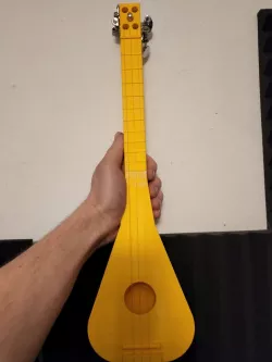 3 string ukulele-like instrument