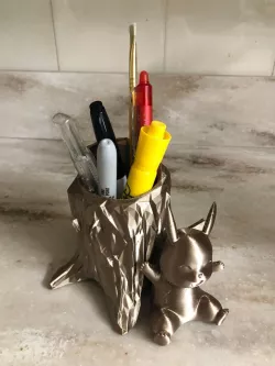 Pikachu with a Low Poly Tree Stump Pencil Holder