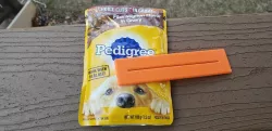 Squeegee for Pedigree pouches