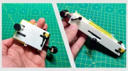 a “SPY” Folding Rubber Bands Gun