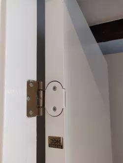 Door hinge fitting 