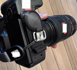 Hidden AirTag mount for Canon R6