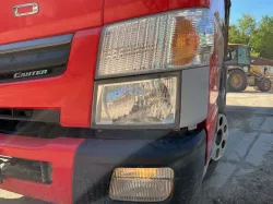 MITSUBISHI CANTER GARNISH HEADLAMP LIGHT MK581221 MK581222