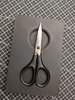 A Gridfinity box for scissors
