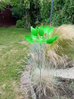 Kinetic wind sculpture lotus flower leaves