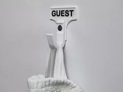 Towel hook with optional label