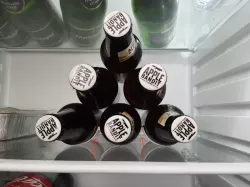 Bottle holder, stacking and anti-rolling