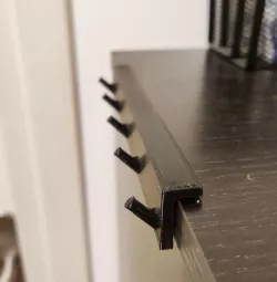 Cupboard key hanger