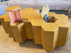 Modular honeycomb coffee table with built-in storage and pop-up light