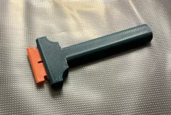 Scraper with replaceable plastic blades