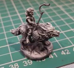 Halfling Female Druid Riding a Wolf