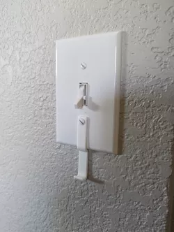 Light switch key hook