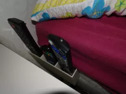 Remote control holder for bed