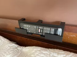 Tv remote bed holder
