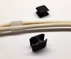 Cable clip: holds two cables together