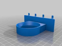 Heat gun holder for pegboards