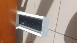 Push to open remote holder